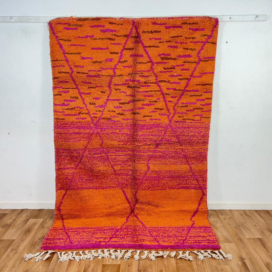 Vintage Moroccan wool rug in orange and magenta with geometric tribal pattern handmade Berber rug