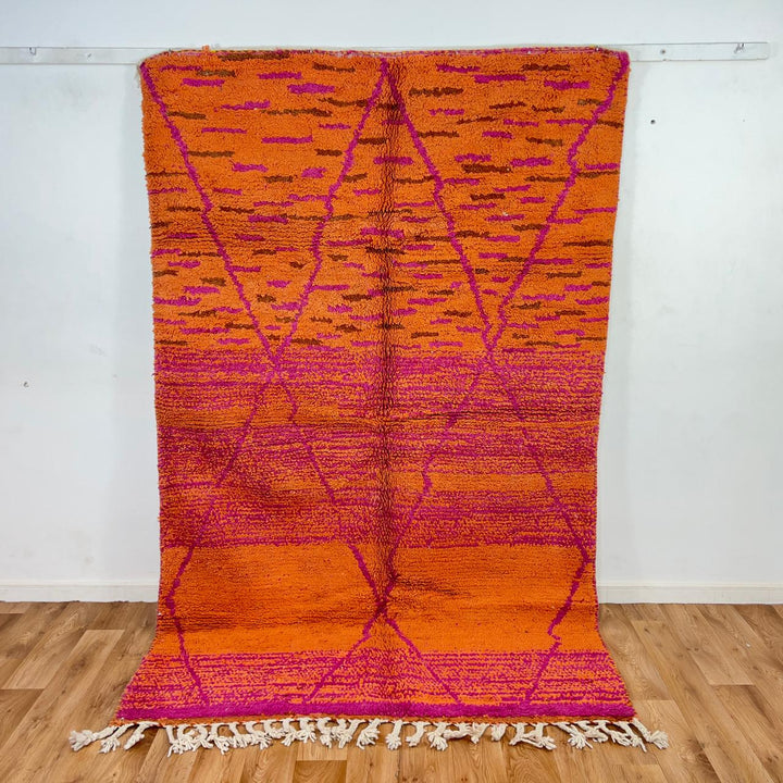 Vintage Moroccan wool rug in orange and magenta with geometric tribal pattern handmade Berber rug
