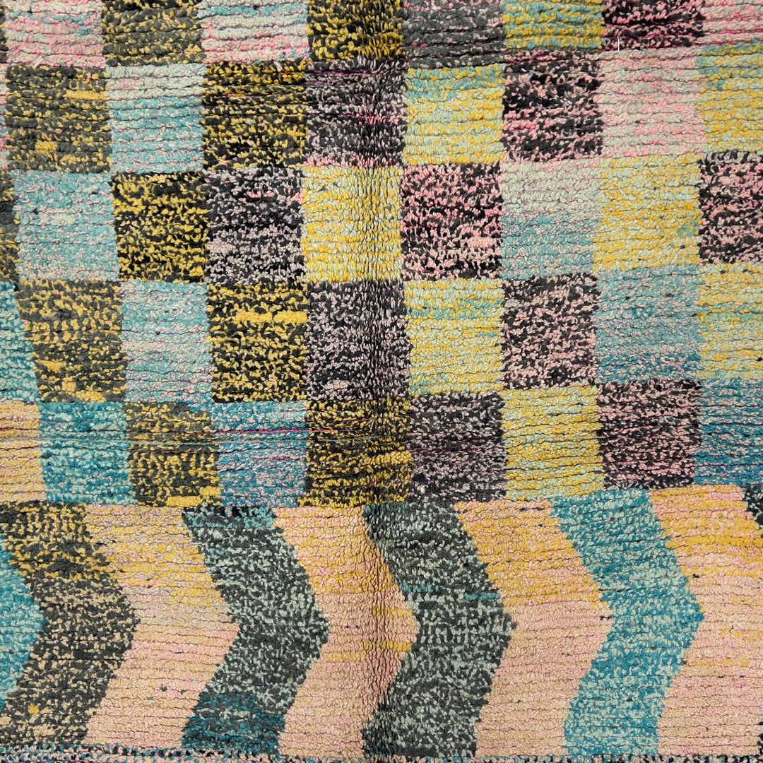 Vintage Moroccan wool rug 8.0 x 5.3 ft with pastel checkered pattern and zigzag design in pink teal and yellow handmade Berber rug