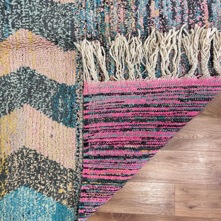 Vintage Moroccan wool rug 8.0 x 5.3 ft with pastel checkered pattern and zigzag design in pink teal and yellow handmade Berber rug