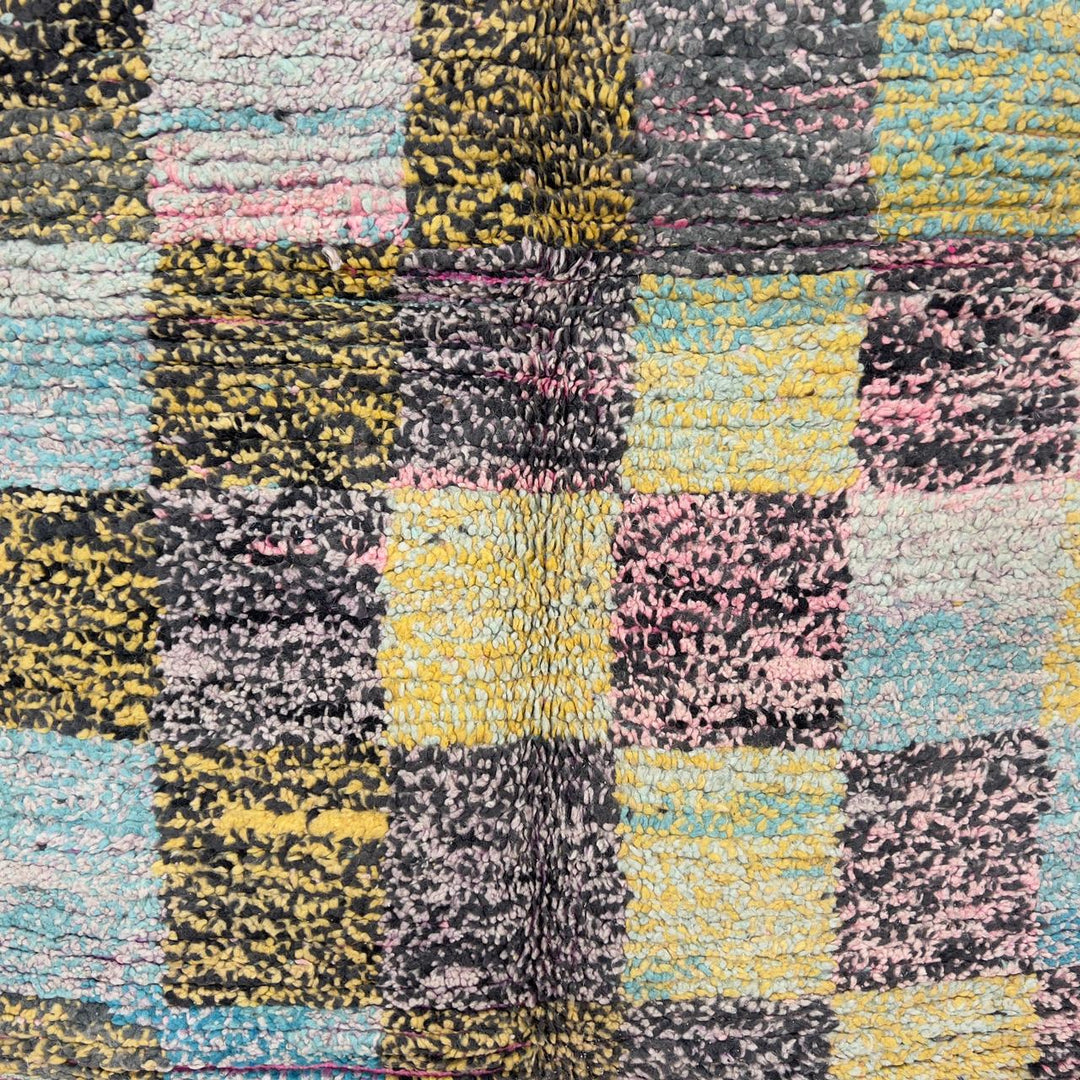 Vintage Moroccan wool rug 8.0 x 5.3 ft with pastel checkered pattern and zigzag design in pink teal and yellow handmade Berber rug
