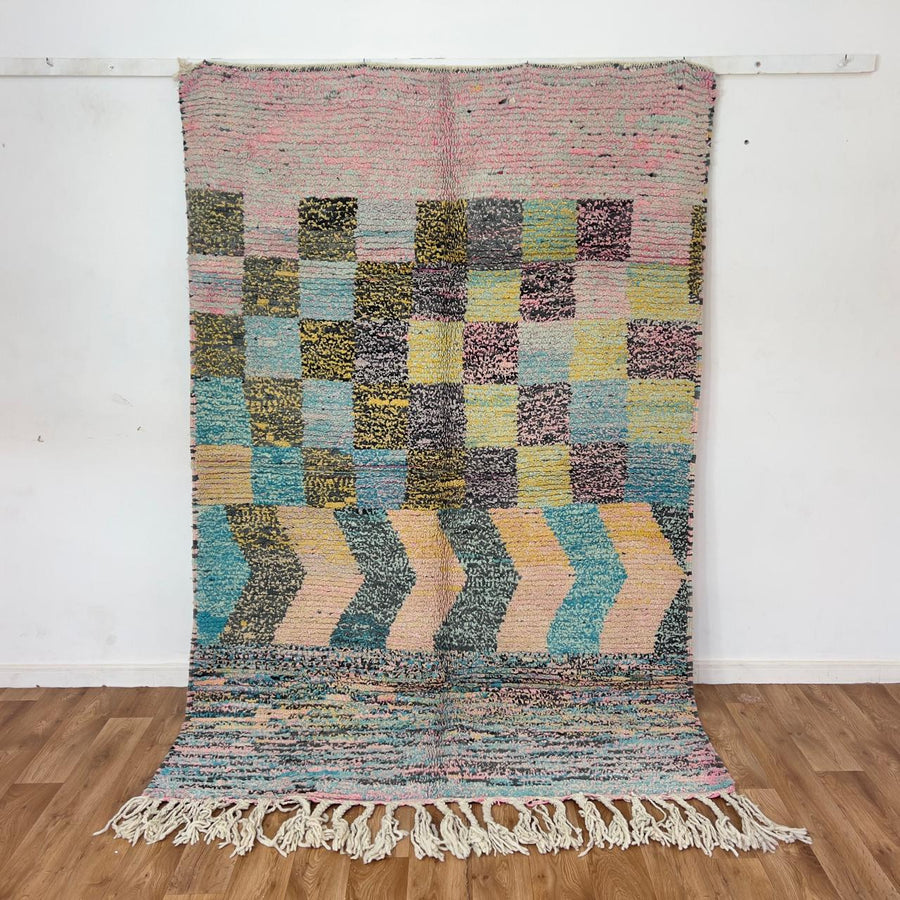 Vintage Moroccan wool rug 8.0 x 5.3 ft with pastel checkered pattern and zigzag design in pink teal and yellow handmade Berber rug