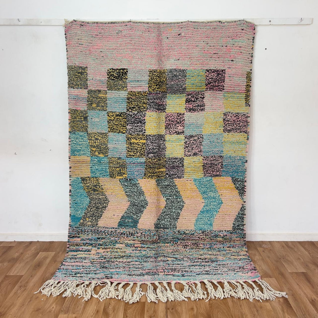 Vintage Moroccan wool rug 8.0 x 5.3 ft with pastel checkered pattern and zigzag design in pink teal and yellow handmade Berber rug