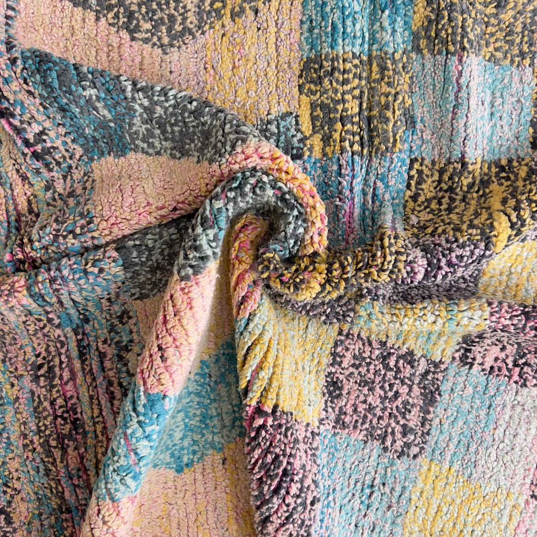 Vintage Moroccan wool rug 8.0 x 5.3 ft with pastel checkered pattern and zigzag design in pink teal and yellow handmade Berber rug