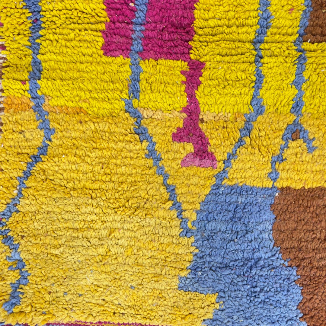 Vintage Moroccan wool rug with colorful patchwork geometric design in pink, blue, yellow and green tones, handmade Berber rug 8x5 ft