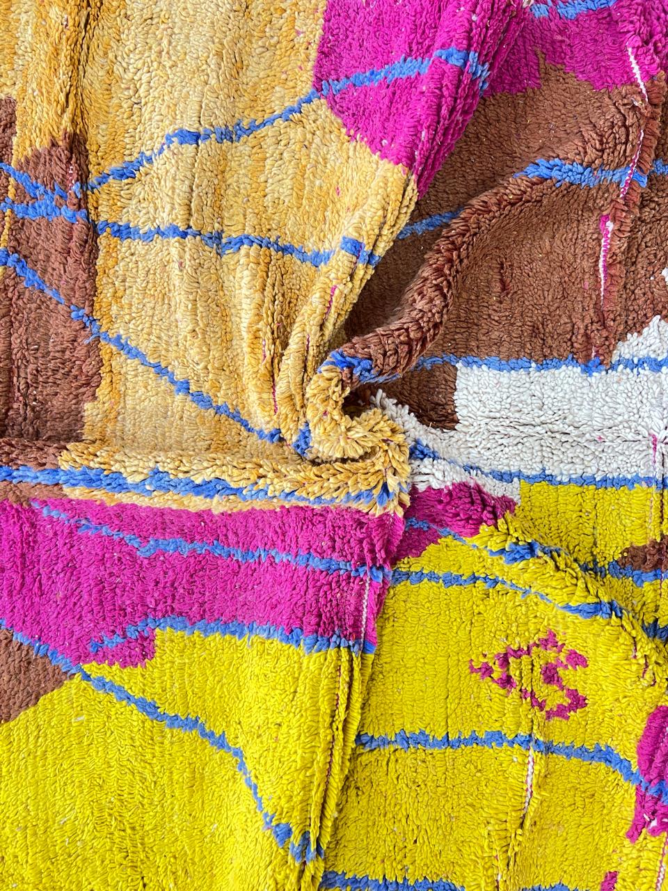 Vintage Moroccan wool rug with colorful patchwork geometric design in pink, blue, yellow and green tones, handmade Berber rug 8x5 ft