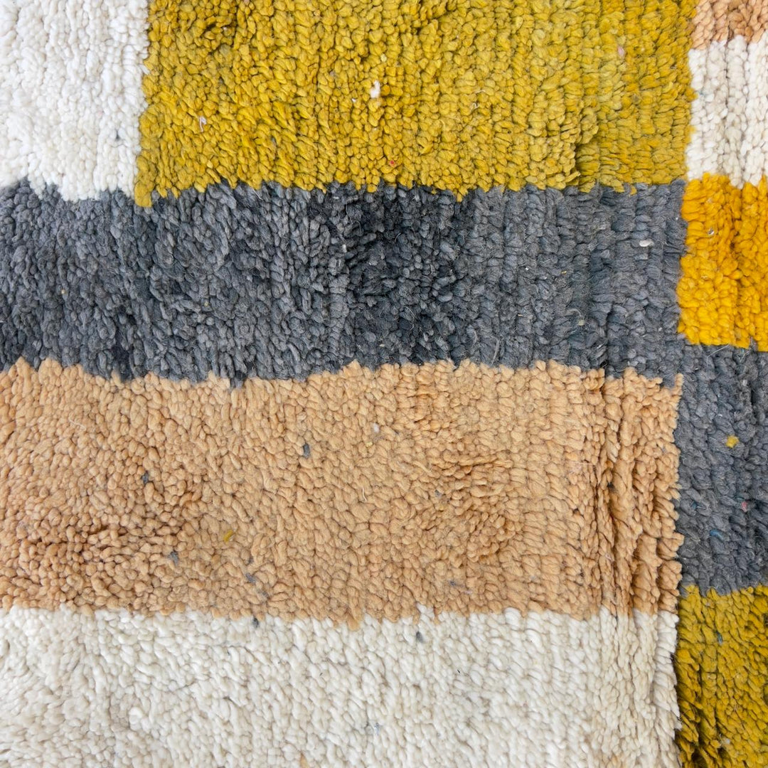 Vintage Moroccan wool rug with colorful stripes and geometric blocks handmade Berber rug