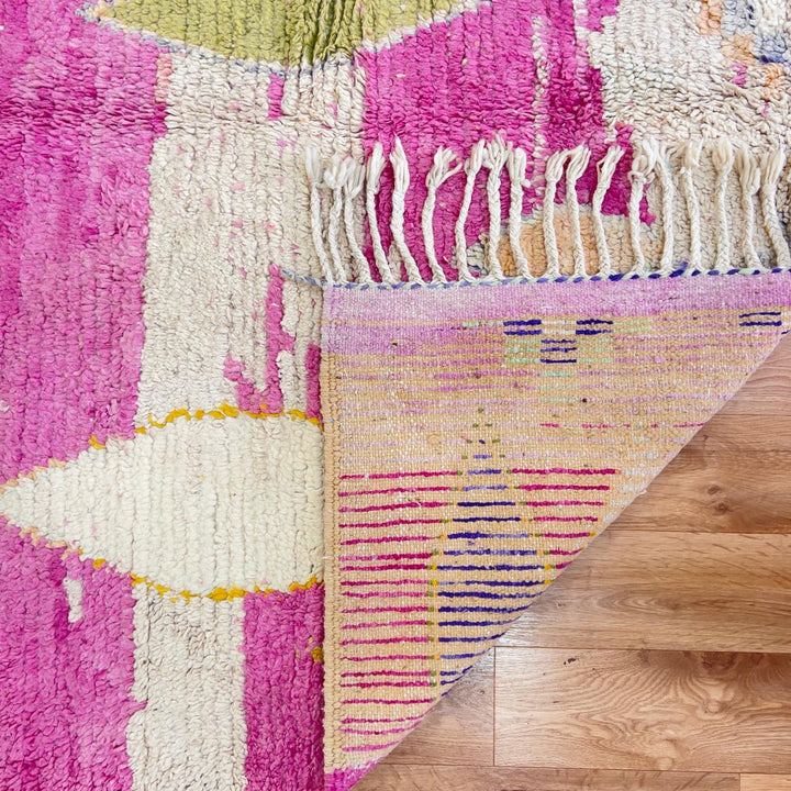 Vintage Moroccan wool rug in pink with abstract geometric Berber patterns, handmade wool rug