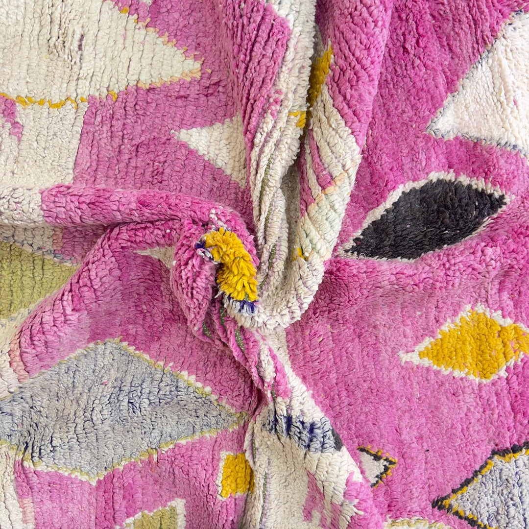 Vintage Moroccan wool rug in pink with abstract geometric Berber patterns, handmade wool rug