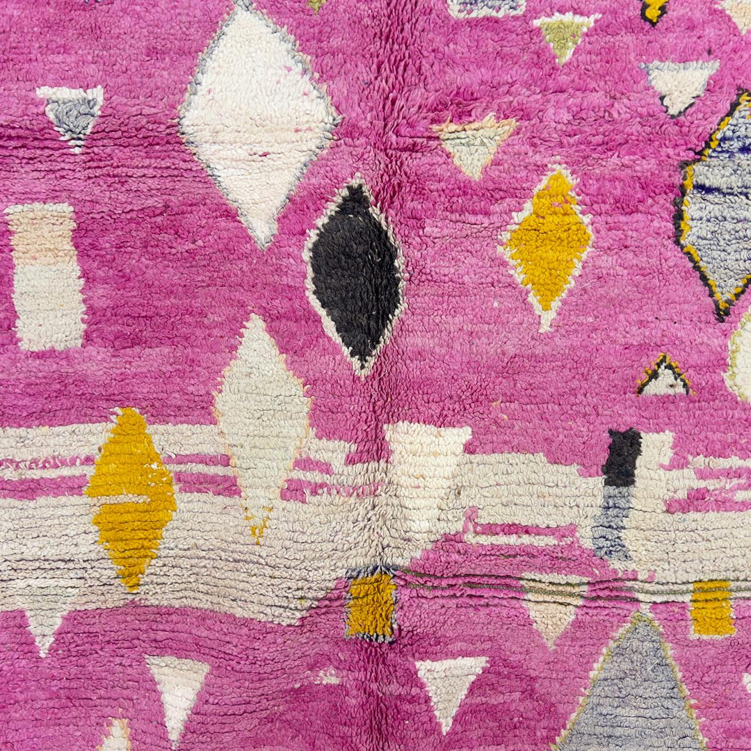 Vintage Moroccan wool rug in pink with abstract geometric Berber patterns, handmade wool rug