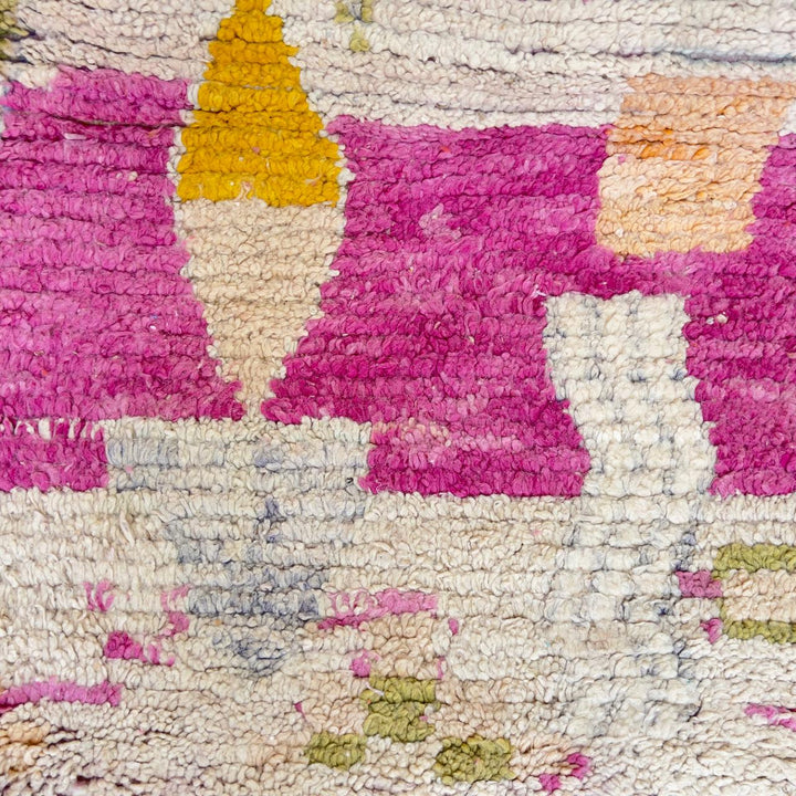 Vintage Moroccan wool rug in pink with abstract geometric Berber patterns, handmade wool rug