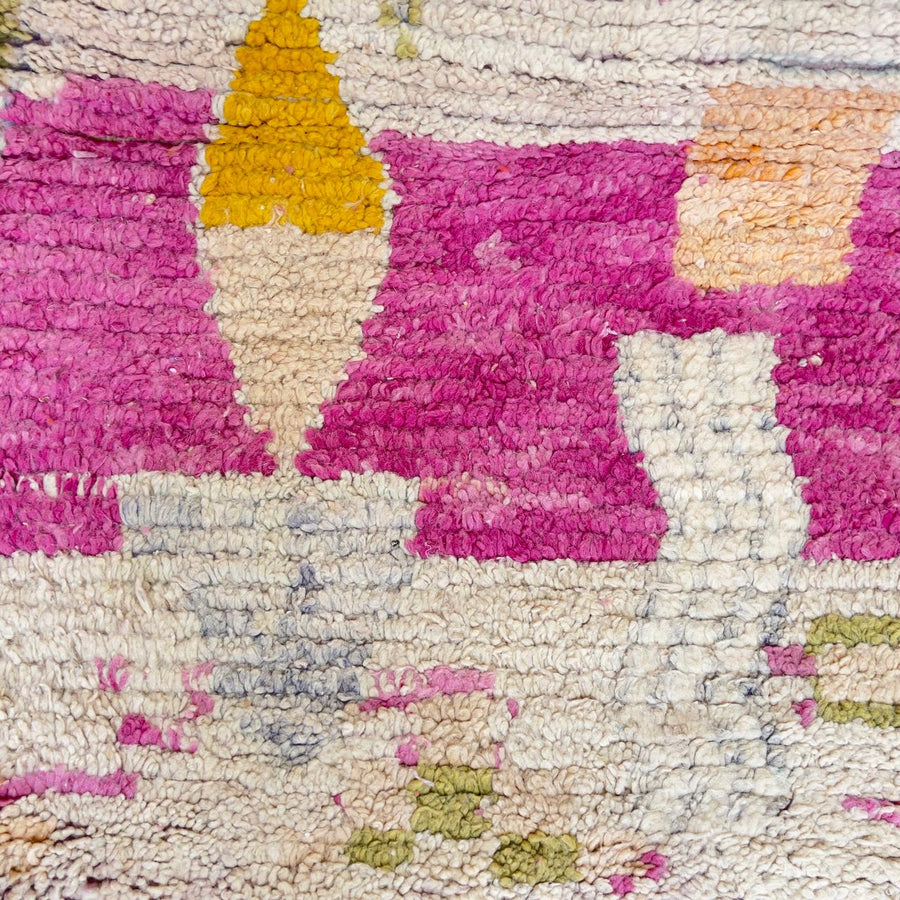 Vintage Moroccan wool rug in pink with abstract geometric Berber patterns, handmade wool rug