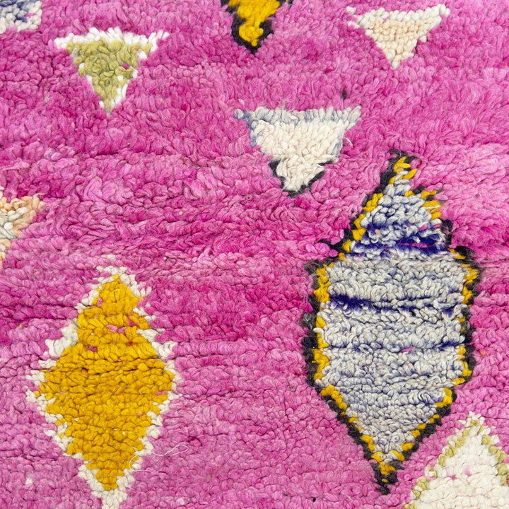 Vintage Moroccan wool rug in pink with abstract geometric Berber patterns, handmade wool rug