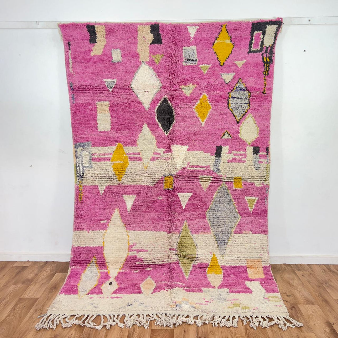 Vintage Moroccan wool rug in pink with abstract geometric Berber patterns, handmade wool rug