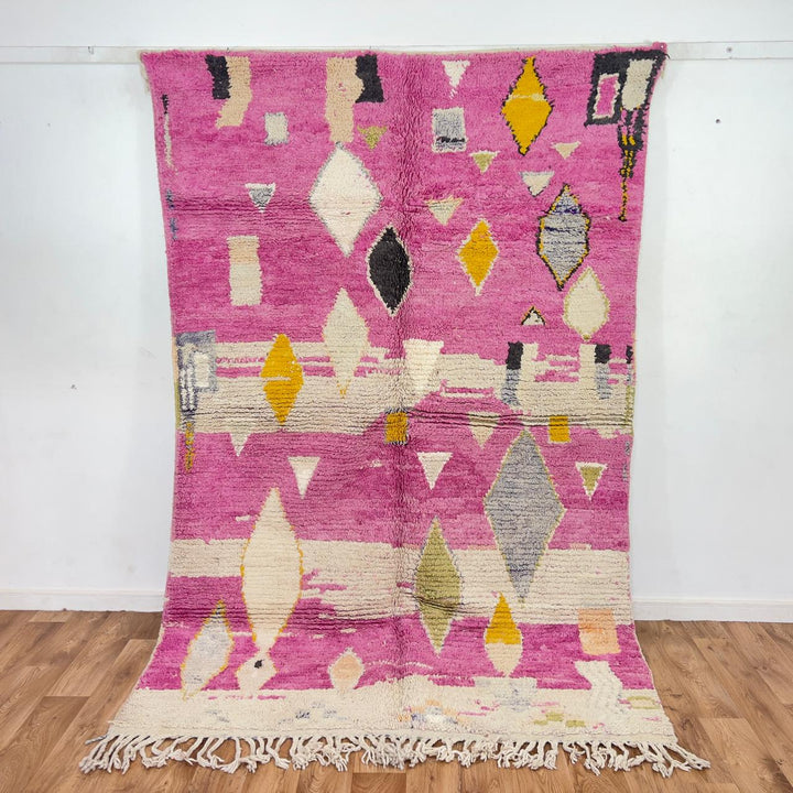 Vintage Moroccan wool rug in pink with abstract geometric Berber patterns, handmade wool rug