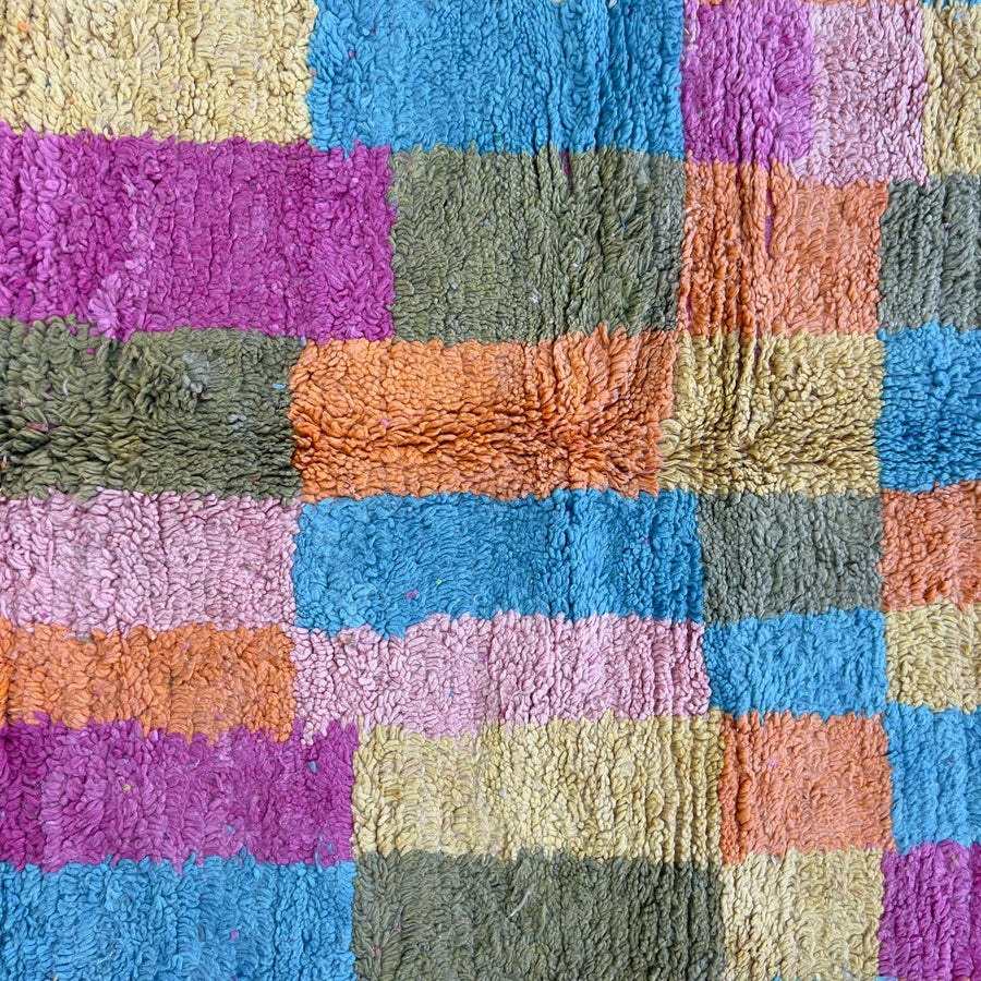 Vintage Moroccan wool rug with colorful patchwork geometric design in pink, blue, yellow and green tones, handmade Berber rug 8x5 ft