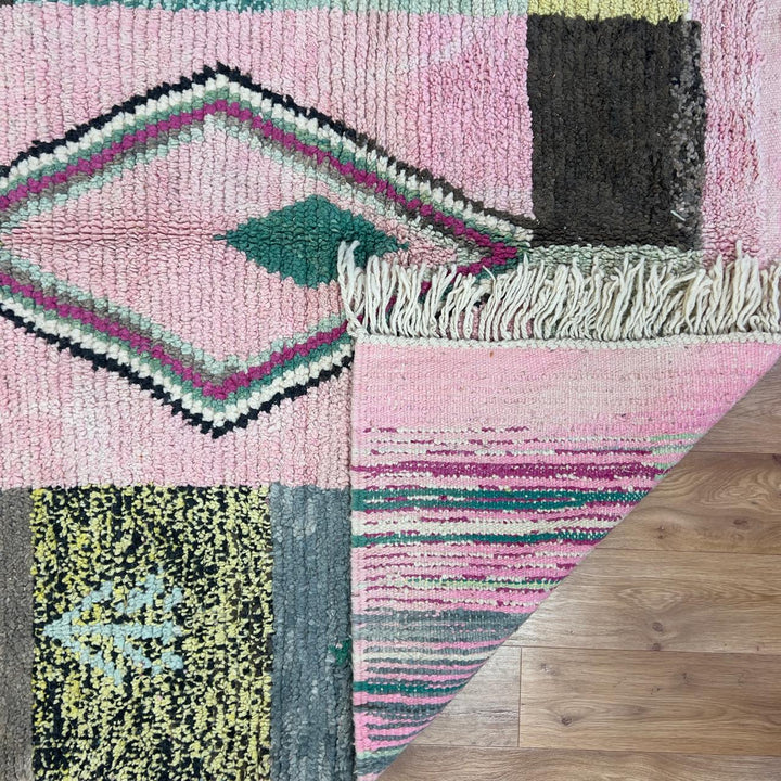 Vintage Moroccan wool rug 8.20 x 5.12 ft Rug 46 featuring central diamond motif with pastel patchwork design in pink, green, cream, and brown tones