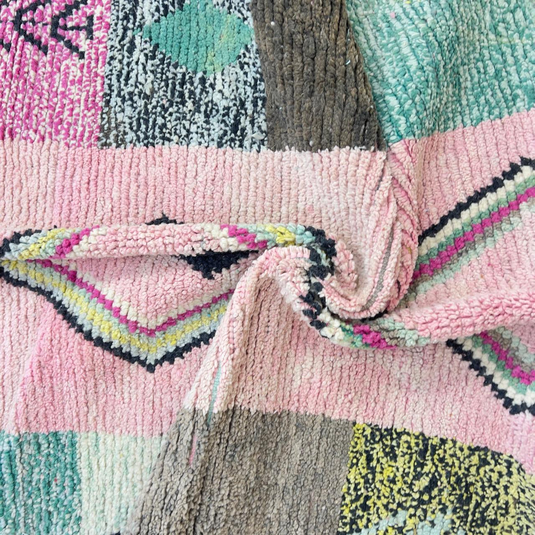 Vintage Moroccan wool rug 8.20 x 5.12 ft Rug 46 featuring central diamond motif with pastel patchwork design in pink, green, cream, and brown tones