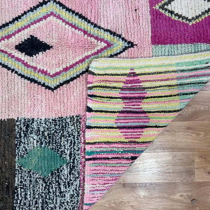 Vintage Moroccan wool rug 8.20 x 5.12 ft Rug 46 featuring central diamond motif with pastel patchwork design in pink, green, cream, and brown tones