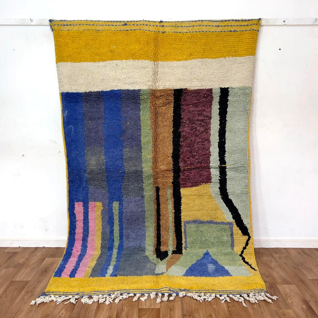 Vintage Moroccan wool rug 8.46 x 5.38 ft with abstract geometric design in blue yellow green and cream handmade Berber rug
