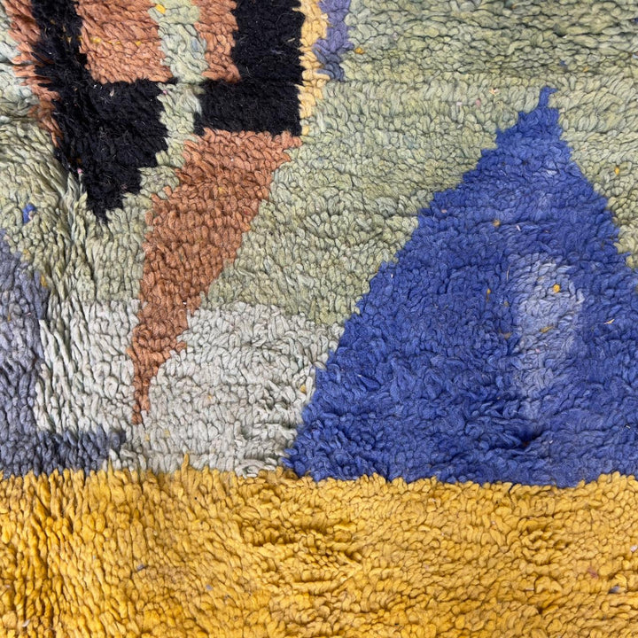 Vintage Moroccan wool rug 8.46 x 5.38 ft with abstract geometric design in blue yellow green and cream handmade Berber rug


