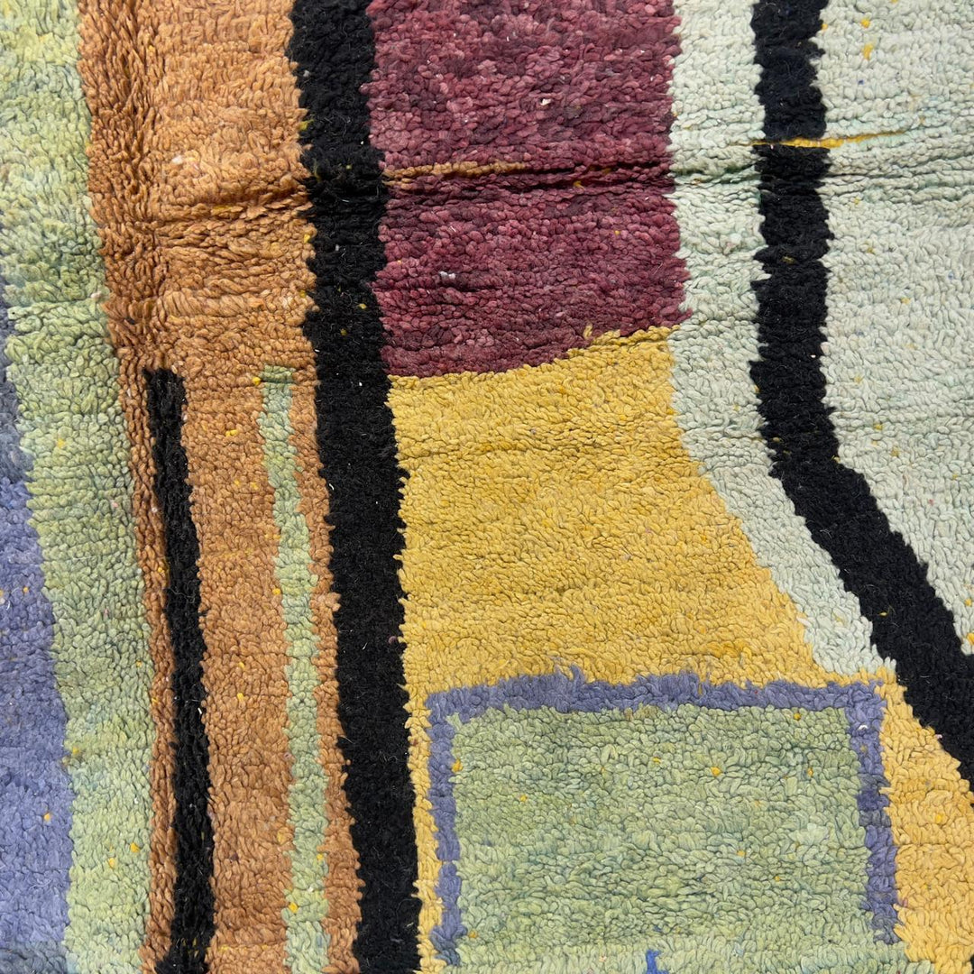 Vintage Moroccan wool rug 8.46 x 5.38 ft with abstract geometric design in blue yellow green and cream handmade Berber rug
