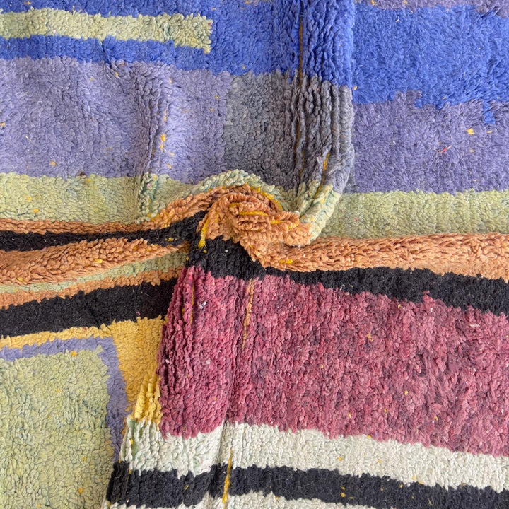 Vintage Moroccan wool rug 8.46 x 5.38 ft with abstract geometric design in blue yellow green and cream handmade Berber rug
