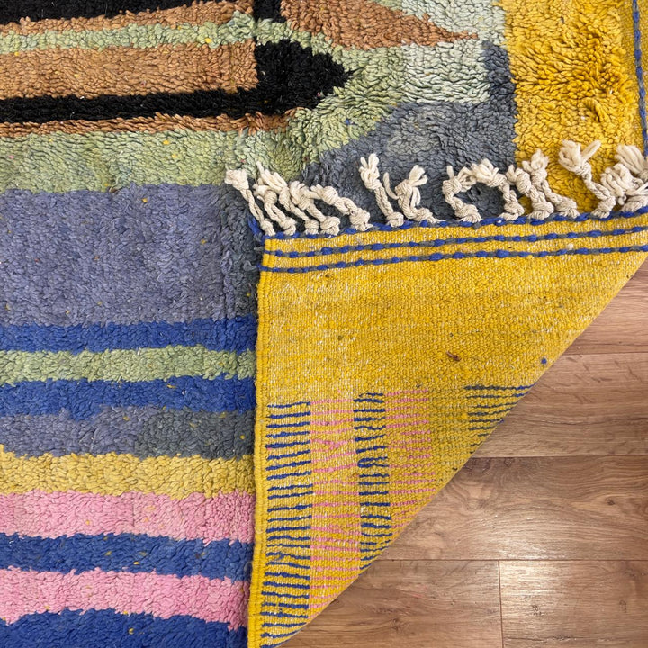 Vintage Moroccan wool rug 8.46 x 5.38 ft with abstract geometric design in blue yellow green and cream handmade Berber rug
