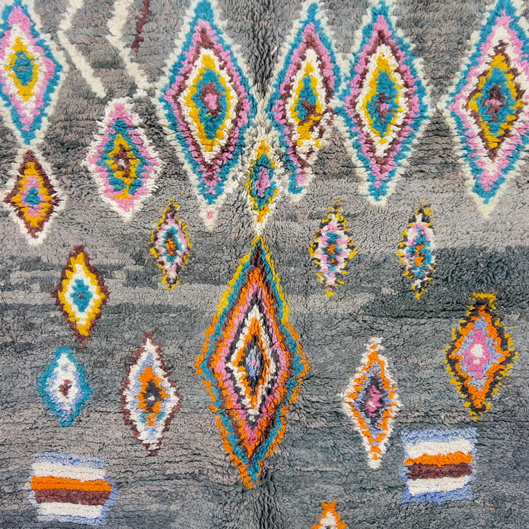 Vintage Moroccan wool rug with colorful diamond patterns on grey background and turquoise border handmade Berber carpet