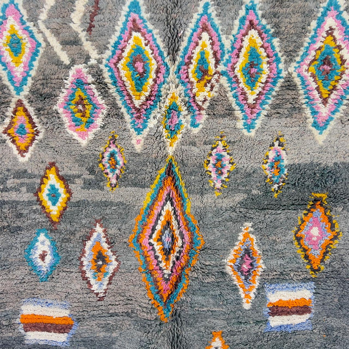 Vintage Moroccan wool rug with colorful diamond patterns on grey background and turquoise border handmade Berber carpet