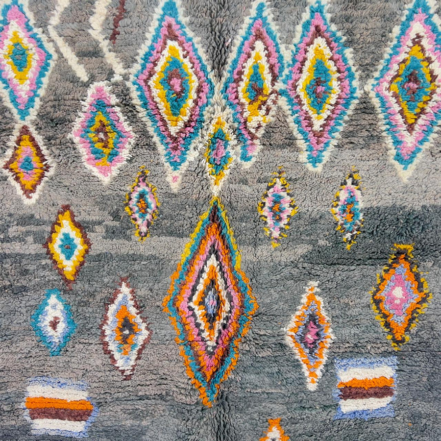 Vintage Moroccan wool rug with colorful diamond patterns on grey background and turquoise border handmade Berber carpet