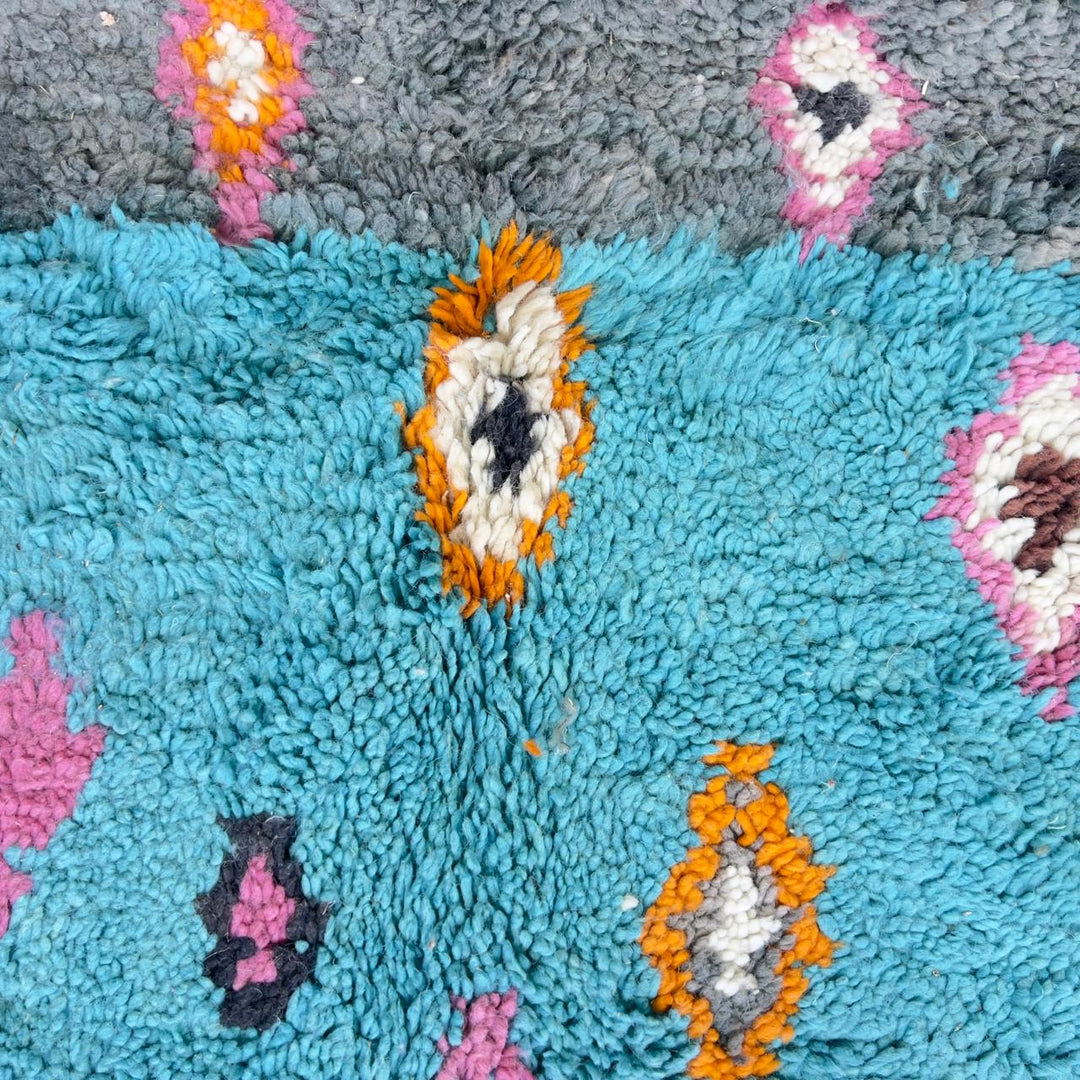 Vintage Moroccan wool rug with colorful diamond patterns on grey background and turquoise border handmade Berber carpet