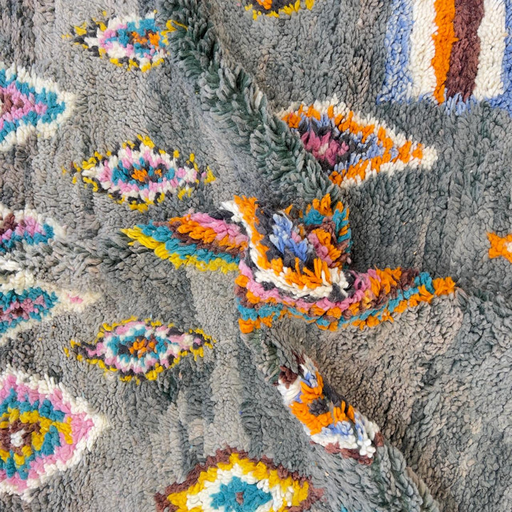 Vintage Moroccan wool rug with colorful diamond patterns on grey background and turquoise border handmade Berber carpet