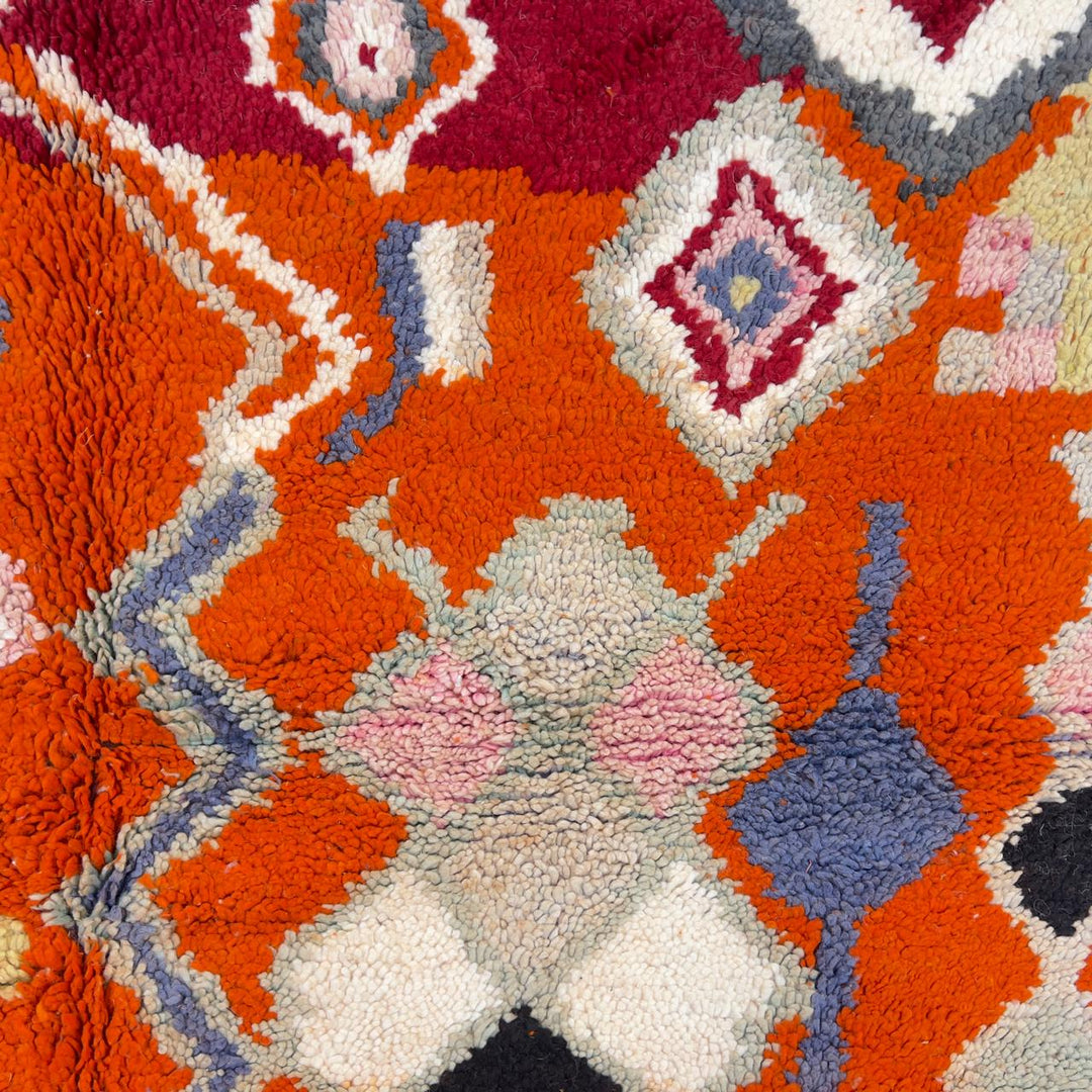 Vintage Moroccan wool rug orange with tribal geometric patterns handmade Berber rug