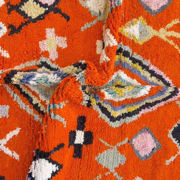 Vintage Moroccan wool rug orange with tribal geometric patterns handmade Berber rug