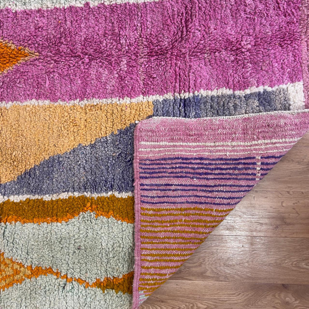Vintage Moroccan wool rug 245x168 cm handmade Berber rug with pink orange and cream abstract geometric design