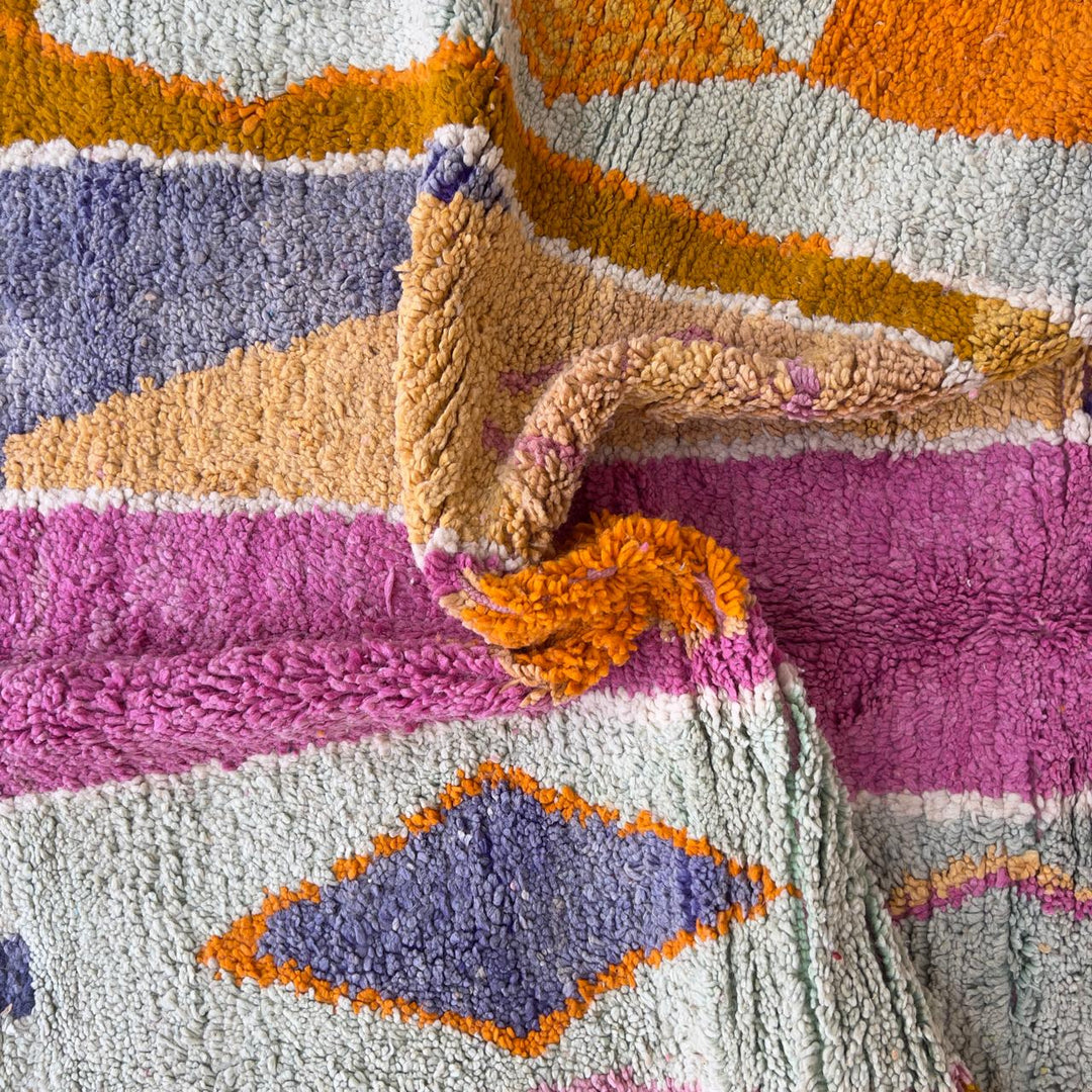 Vintage Moroccan wool rug 245x168 cm handmade Berber rug with pink orange and cream abstract geometric design