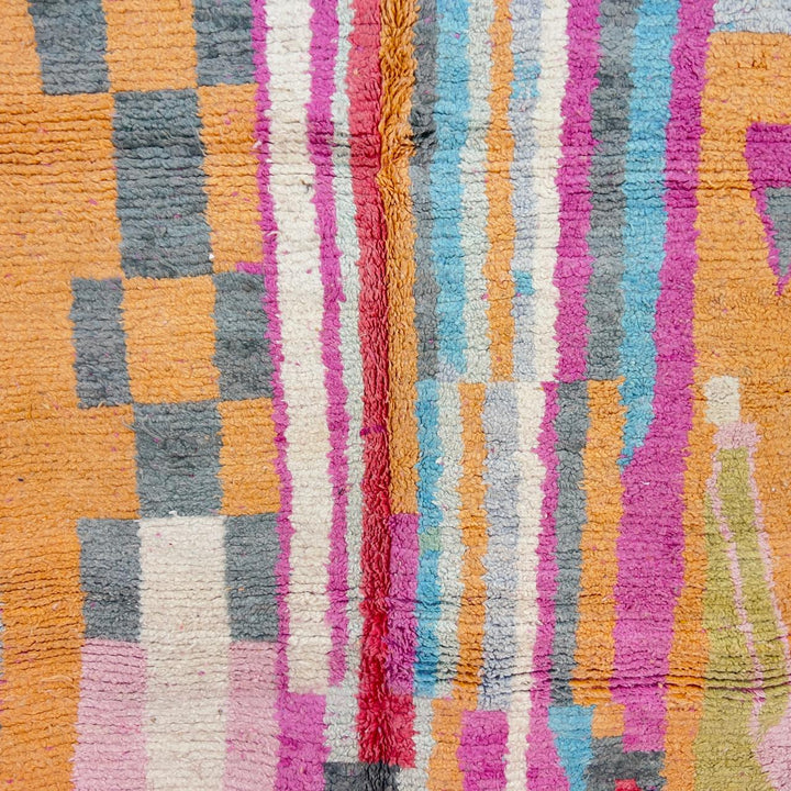 Vintage Moroccan wool rug with colorful abstract geometric pattern in pink, yellow and grey handmade Berber rug