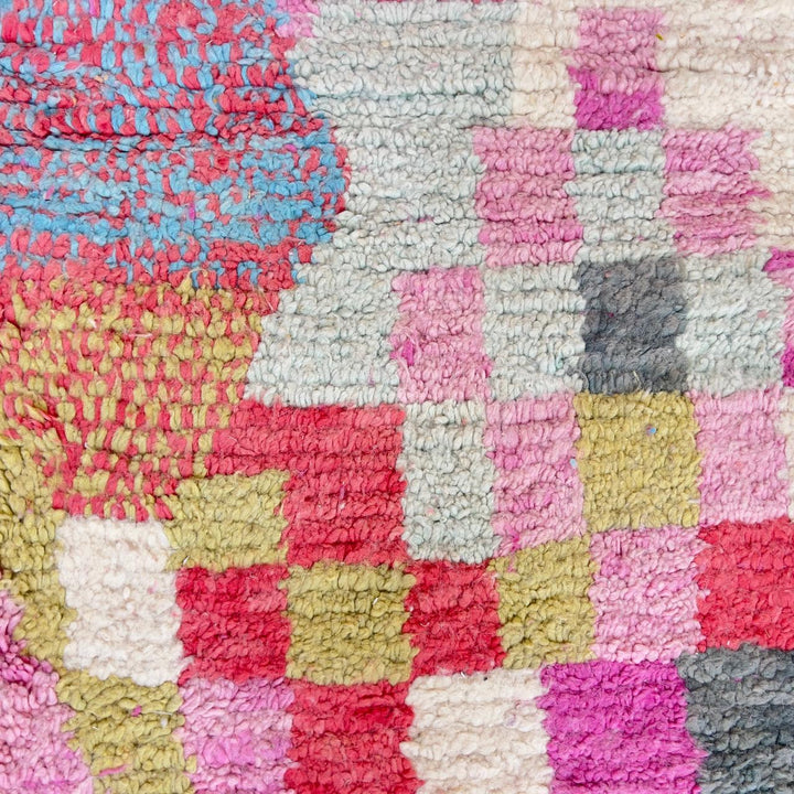 Vintage Moroccan wool rug with colorful abstract geometric pattern in pink, yellow and grey handmade Berber rug
