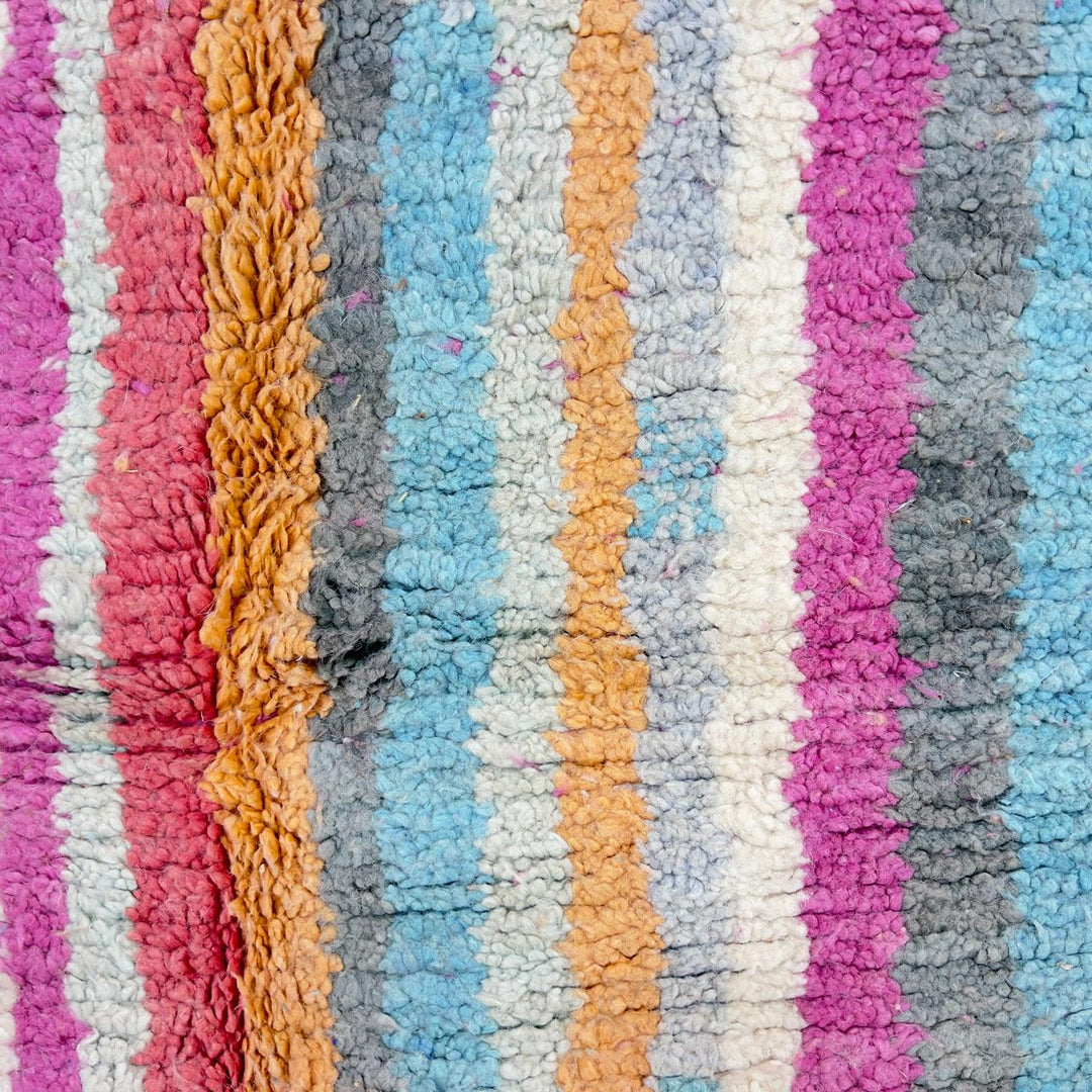Vintage Moroccan wool rug with colorful abstract geometric pattern in pink, yellow and grey handmade Berber rug