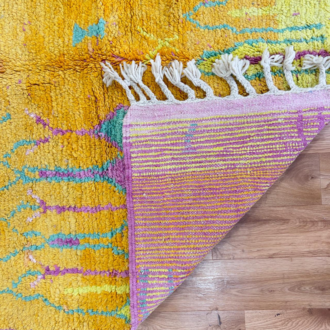 Vintage Moroccan wool rug with colorful abstract flowing design in yellow, pink and turquoise tones, handmade Berber rug