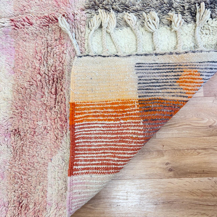 Vintage Moroccan wool rug with ivory base and orange tribal accents handmade Berber minimalist rug