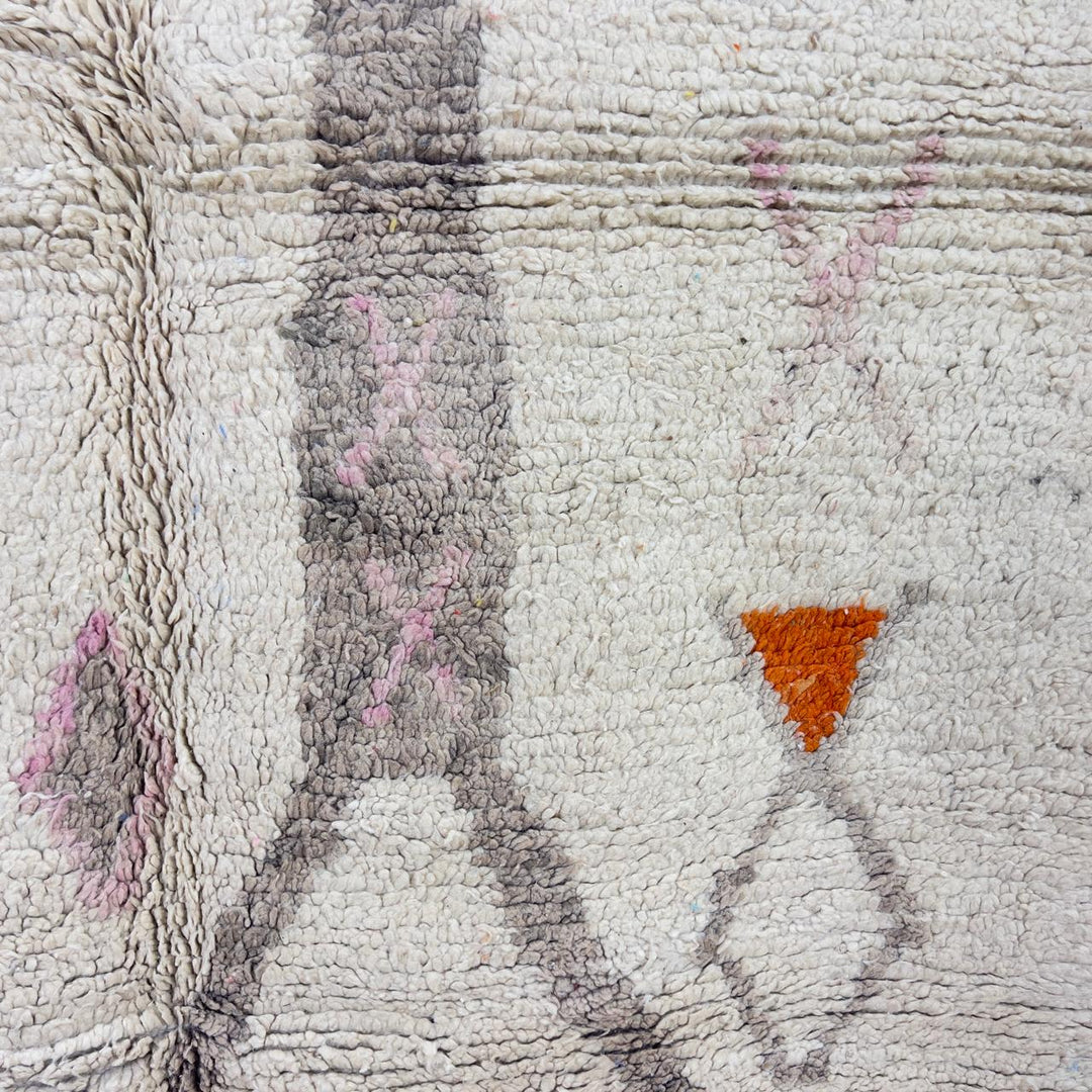 Vintage Moroccan wool rug with ivory base and orange tribal accents handmade Berber minimalist rug