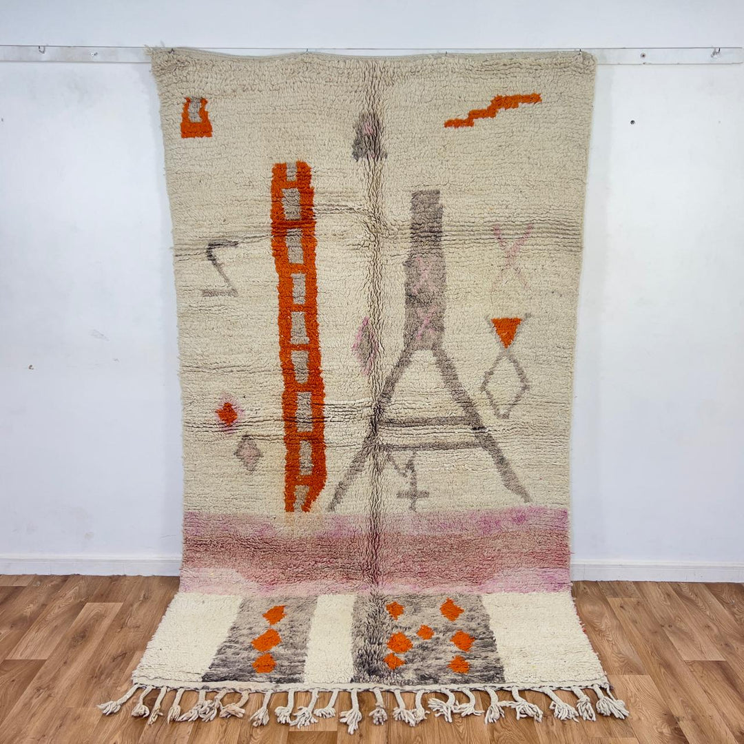 Vintage Moroccan wool rug with ivory base and orange tribal accents handmade Berber minimalist rug