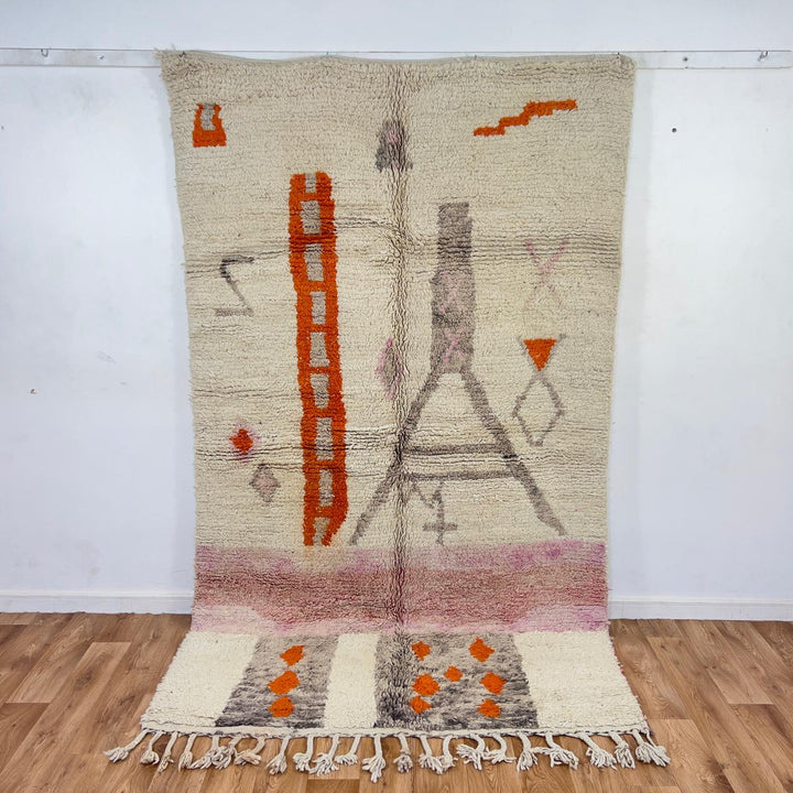 Vintage Moroccan wool rug with ivory base and orange tribal accents handmade Berber minimalist rug