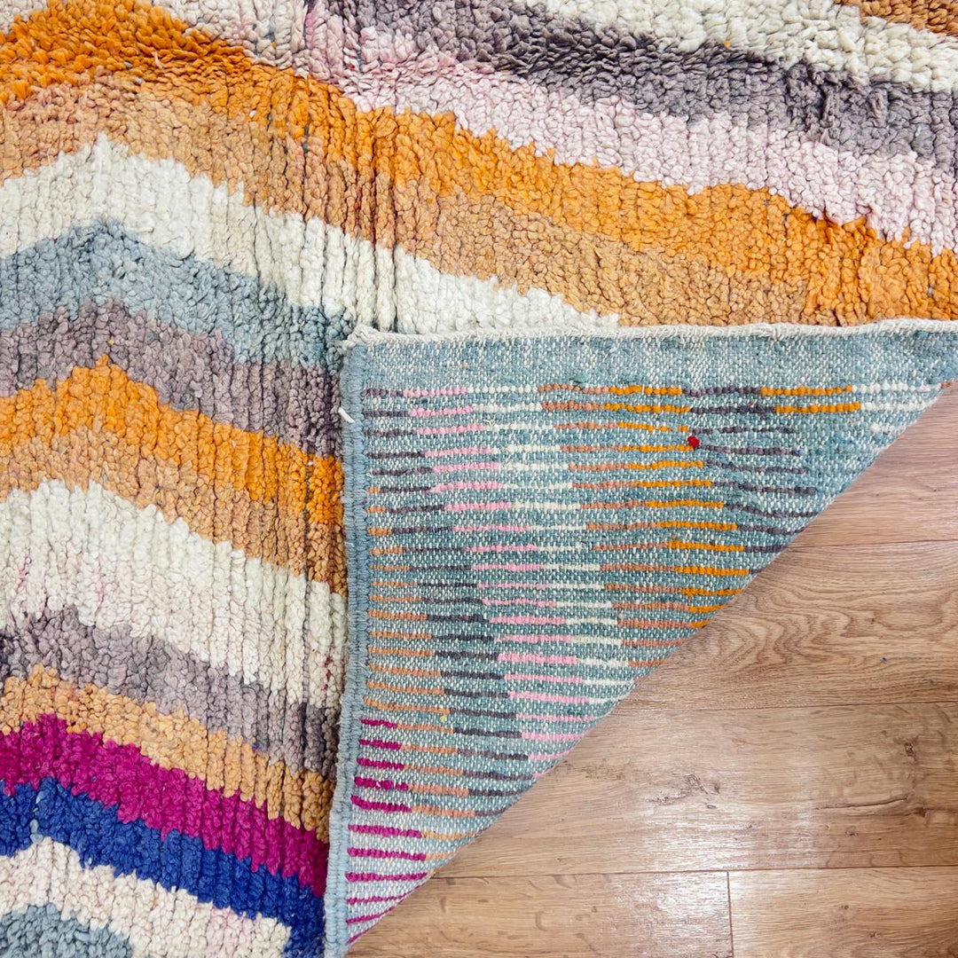 Vintage Moroccan wool rug with abstract vertical lines and geometric pattern in yellow orange and grey handmade Berber rug