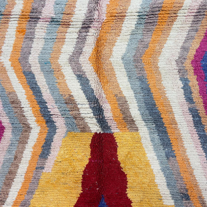 Vintage Moroccan wool rug with abstract vertical lines and geometric pattern in yellow orange and grey handmade Berber rug