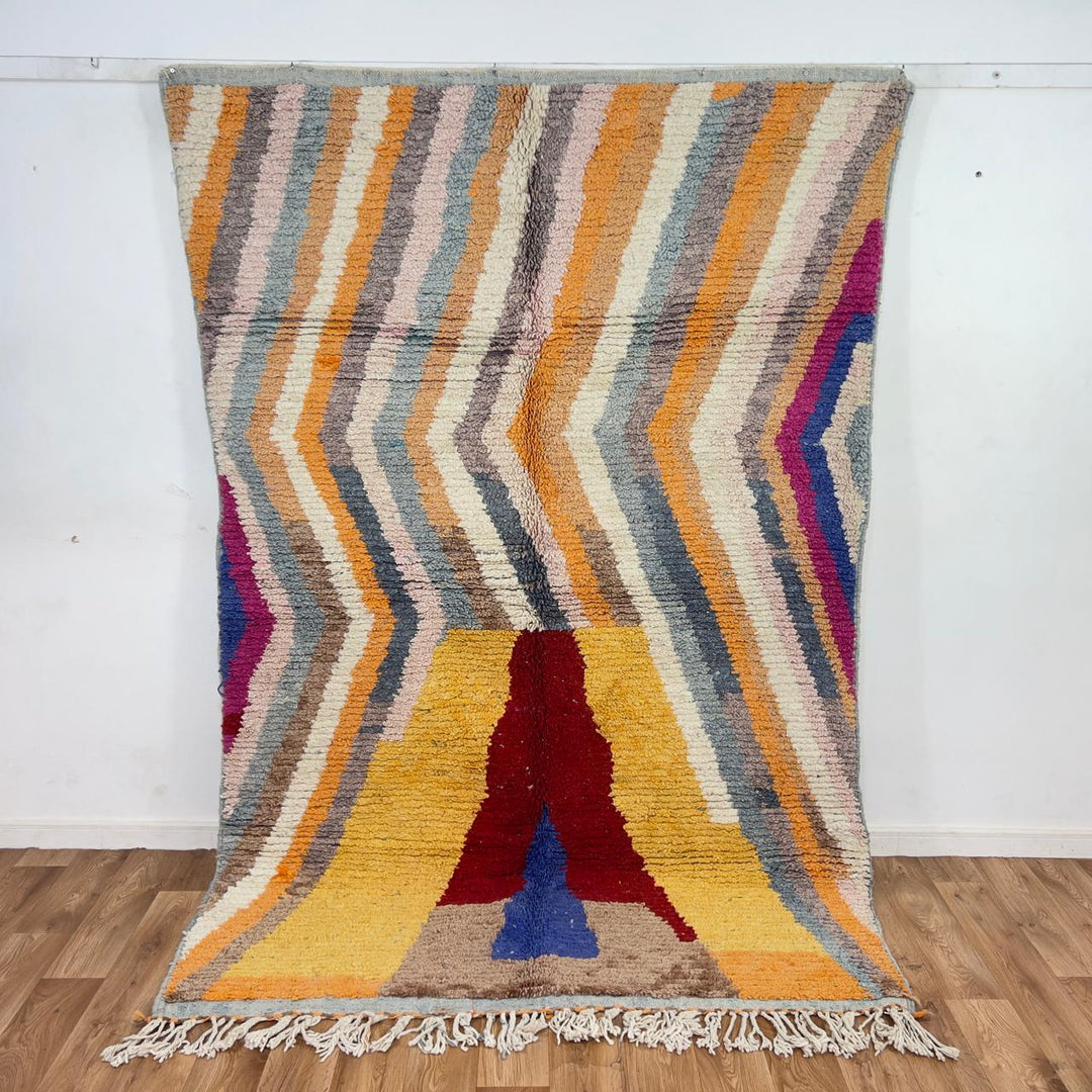 Vintage Moroccan wool rug with abstract vertical lines and geometric pattern in yellow orange and grey handmade Berber rug