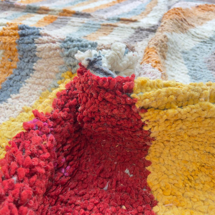Vintage Moroccan wool rug with abstract vertical lines and geometric pattern in yellow orange and grey handmade Berber rug