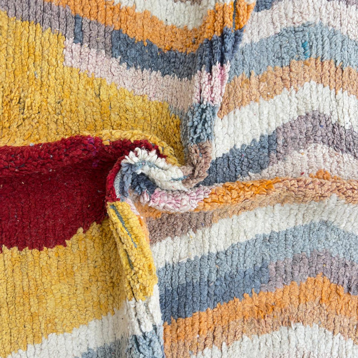 Vintage Moroccan wool rug with abstract vertical lines and geometric pattern in yellow orange and grey handmade Berber rug
